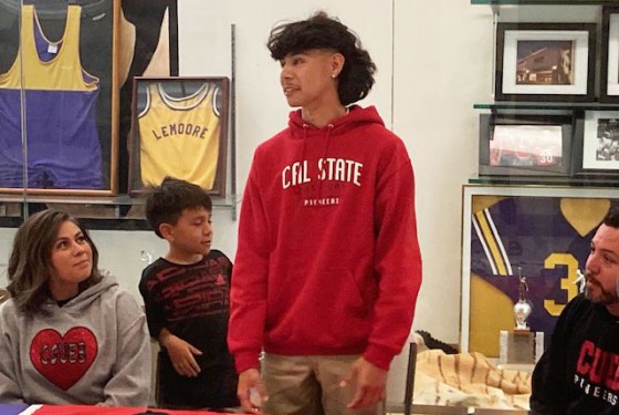 Lemoore's Dominick Najor at his signing recently in the Lemoore High School Event Center.
